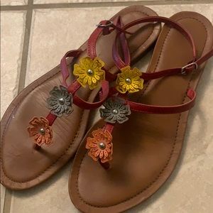 Red sandals with multicolor flowers